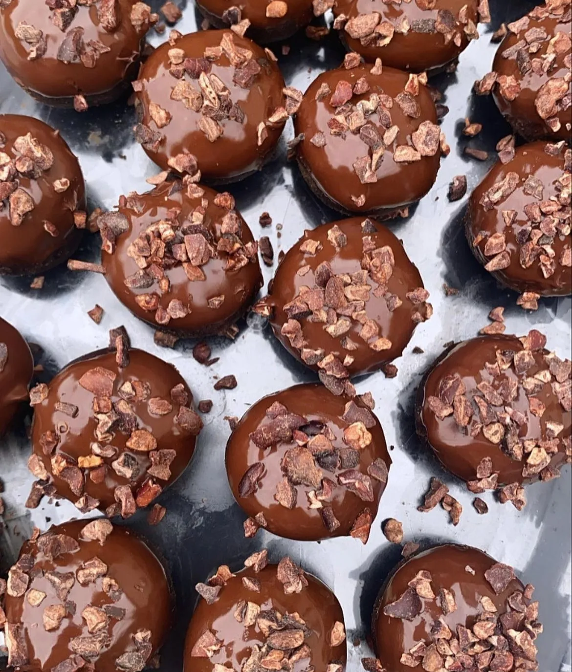 Mint Chocolate Brownie Protein Bakes topped with cacao nibs